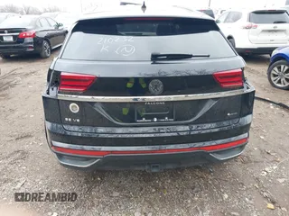 2023 Volkswagen Atlas SE z VIN 1V2HE2CA1PC210232, wystawiony jako IAAI lot #40966039 z przebiegiem 4 064 mil mil oraz . Historia ofert i sprzedaży dostępna na DreamBid. Obrazek 16.