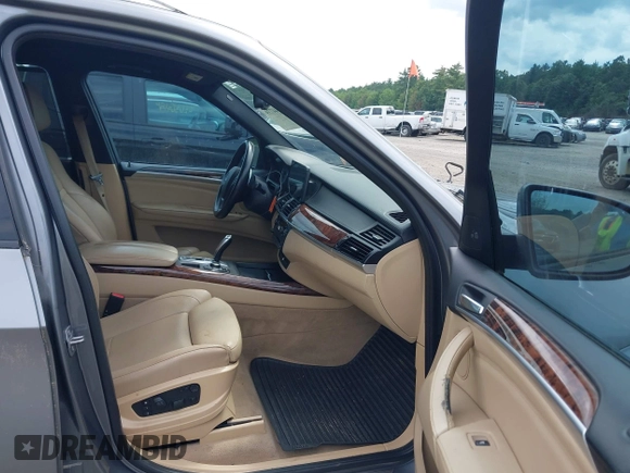 2013 BMW X5 xDrive50i with VIN 5UXZV8C52D0C15272, listed as a IAAI auction lot 42644739 with 169,393 mi miles and . Bid and sale history available at DreamBid. Image 5.