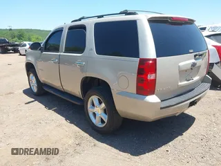 2007 Chevrolet Tahoe LTZ with VIN 1GNFK13037R265384, listed as a IAAI auction lot 42343911 with 162,688 mi miles and . Bid and sale history available at DreamBid. Image 3.