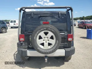2012 Jeep Wrangler Unlimited Sahara with VIN 1C4HJWEG5CL205826, listed as a Copart auction lot 58222115 with 98,940 mi miles and Salvage title. Bid and sale history available at DreamBid. Image 6.