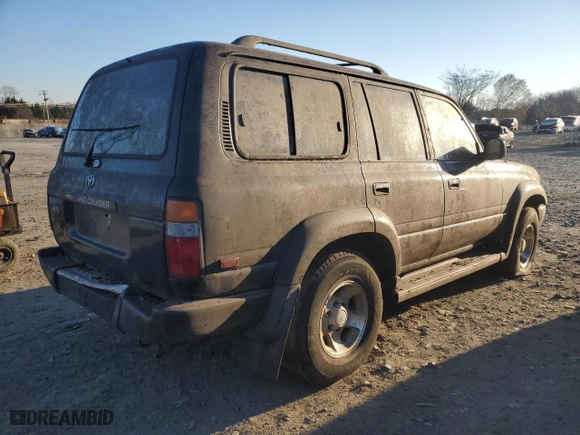 1997 Toyota Land Cruiser with VIN JT3HJ85J4V0152780, listed as a Copart auction lot 80389554 with 162,639 mi miles and Clean Title. Bid and sale history available at carsss.com. Image 3.
