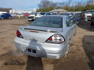 2004 Pontiac Grand Am SE1 with VIN 1G2NF52E24C239133, listed as a IAAI auction lot 41458613 with 149,815 mi miles and . Bid and sale history available at DreamBid. Image 4.
