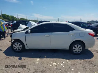 2019 Toyota Corolla L with VIN 5YFBURHE0KP882524, listed as a IAAI auction lot 41862382 with 84,981 mi miles. Bid and sale history available at carsss.com. Image 15.