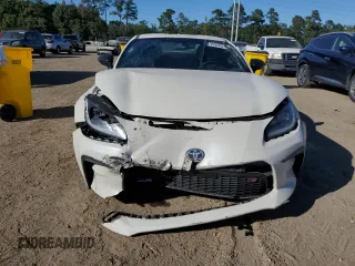 2023 Toyota GR86 Premium with VIN JF1ZNBE10P9762875, listed as a Copart auction lot 73985624 with 10,593 mi miles and Salvage Title. Bid and sale history available at carsss.com. Image 5.