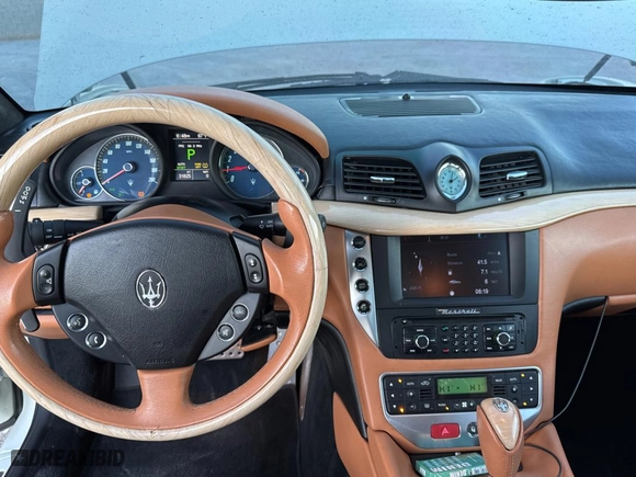 2012 Maserati GranTurismo S with VIN ZAM45KLA1C0061862, listed as a Copart auction lot 87091844 with 31,825 mi miles and Clean Title. Bid and sale history available at carsss.com. Image 9.