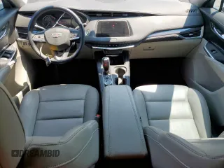 2023 Cadillac XT4 FWD Luxury z VIN 1GYAZAR42PF102696, wystawiony jako Copart lot #60524065 z przebiegiem 1 903 mil mil oraz Szkoda całkowita • Salvage title. Historia ofert i sprzedaży dostępna na DreamBid. Obrazek 8.
