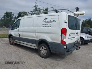 2015 Ford Transit Cargo with VIN 1FTNR1ZM6FKA34609, listed as a IAAI auction lot 42635875 with 214,750 mi miles and . Bid and sale history available at DreamBid. Image 3.