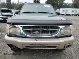 1999 Ford Explorer XLT с VIN 1FMZU35P7XZB70506, выставлен на аукционе Copart как лот 87481204 с пробегом 155 683 миль миль и Списание • Salvage title. История ставок и продаж доступна на DreamBid. Изображение 5.