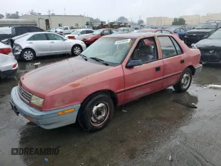 1992 Plymouth Sundance z VIN 1P3XP28D4NN165248, wystawiony jako Copart lot #44205855 z przebiegiem 70 897 mil mil oraz Tytuł czysty. Historia ofert i sprzedaży dostępna na DreamBid. Obrazek 1.