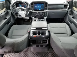 2024 Ford F-150 Lightning XLT z VIN 1FTVW3LK0RWG05326, wystawiony jako Copart lot #55842435 z przebiegiem 23 914 mil mil oraz Czysty tytuł • Clean title. Historia ofert i sprzedaży dostępna na DreamBid. Obrazek 8.