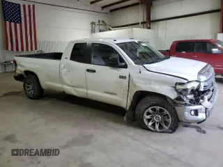 2014 Toyota Tundra 4WD Truck SR with VIN 5TFCW5F12EX016594, listed as a Copart auction lot 47426765 with 235,540 mi miles and Salvage Title. Bid and sale history available at carsss.com. Image 4.