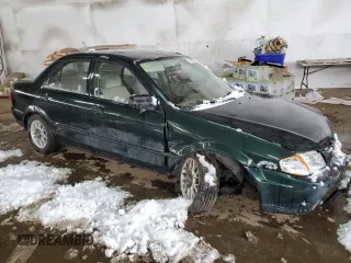 1999 Mazda Protege DX z VIN JM1BJ2220X0108600, wystawiony jako Copart lot #77004894 z przebiegiem 220 836 mil mil oraz Szkoda całkowita • Salvage title. Historia ofert i sprzedaży dostępna na DreamBid. Obrazek 4.