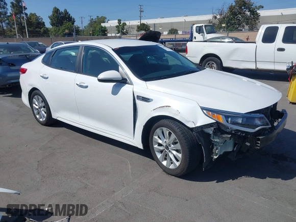 2018 Kia Optima LX z VIN 5XXGT4L35JG265371, wystawiony jako IAAI lot #42494354 z przebiegiem 86 411 mil mil oraz . Historia ofert i sprzedaży dostępna na DreamBid. Obrazek 1.