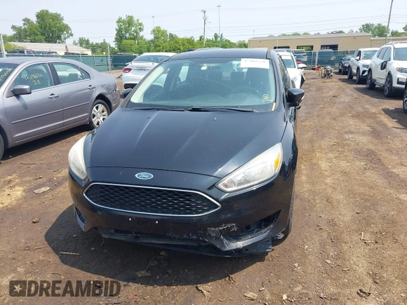 2017 Ford Focus SE with VIN 1FADP3F25HL292056, listed as a IAAI auction lot 42409320 with 102,956 mi miles and . Bid and sale history available at DreamBid. Image 12.