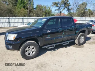 2014 Toyota Tacoma with VIN 3TMLU4EN6EM162989, listed as a Copart auction lot 51903195 with 202,406 mi miles and Salvage title. Bid and sale history available at DreamBid. Image 1.