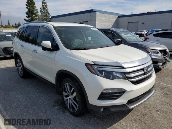 2017 Honda Pilot Touring with VIN 5FNYF6H91HB080607, listed as a Copart auction lot 49119715 with 61,490 mi miles and Salvage Title. Bid and sale history available at carsss.com. Image 4.
