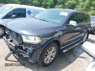 2014 Dodge Durango Citadel with VIN 1C4RDJEG8EC480656, listed as a IAAI auction lot 42438581 with 182,615 mi miles and . Bid and sale history available at DreamBid. Image 2.