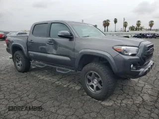 2016 Toyota Tacoma SR with VIN 3TMCZ5AN6GM018536, listed as a Copart auction lot 49336645 with 103,298 mi miles and Salvage Title. Bid and sale history available at carsss.com. Image 4.