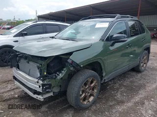 2024 Toyota RAV4 Hybrid LE with VIN 2T3UWRFV4RW219138, listed as a IAAI auction lot 42268211 with 12,423 mi miles and . Bid and sale history available at DreamBid. Image 2.