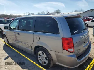 2013 Dodge Grand Caravan Crew with VIN 2C4RDGDG7DR795748, listed as a Copart auction lot 50329195 with 223,956 mi miles and Salvage Title. Bid and sale history available at DreamBid. Image 2.