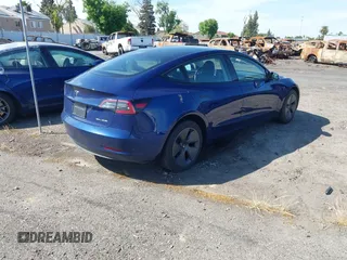 2023 Tesla Model 3 Long Range with VIN 5YJ3E1EB0PF620745, listed as a IAAI auction lot 42010603 with 39,846 mi miles and . Bid and sale history available at DreamBid. Image 4.