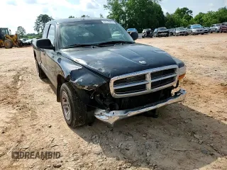 2001 Dodge Dakota z VIN 1B7GL22X81S204868, wystawiony jako Copart lot #57178895 z przebiegiem 298 667 mil mil oraz Szkoda całkowita • Salvage title. Historia ofert i sprzedaży dostępna na DreamBid. Obrazek 13.