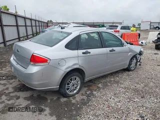 2010 Ford Focus SE with VIN 1FAHP3FN7AW200994, listed as a IAAI auction lot 39878172 with 146,211 mi miles. Bid and sale history available at carsss.com. Image 4.