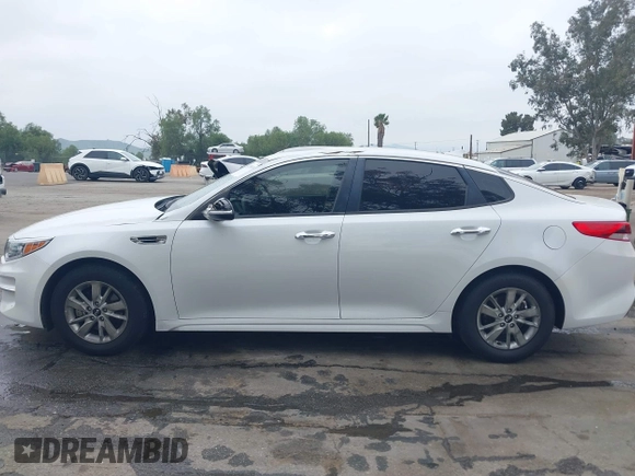 2018 Kia Optima LX with VIN 5XXGT4L3XJG215632, listed as a IAAI auction lot 41785035 with 94,854 mi miles and . Bid and sale history available at DreamBid. Image 14.