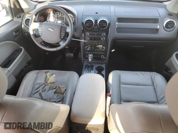 2008 Ford Taurus X SEL with VIN 1FMDK02W68GA27117, listed as a Copart auction lot 52310685 with 178,529 mi miles and Salvage Title. Bid and sale history available at DreamBid. Image 8.