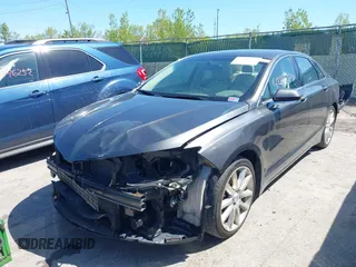 2015 Lincoln MKZ z VIN 3LN6L2G93FR607192, wystawiony jako IAAI lot #42226377 z przebiegiem 74 018 mil mil oraz . Historia ofert i sprzedaży dostępna na DreamBid. Obrazek 6.