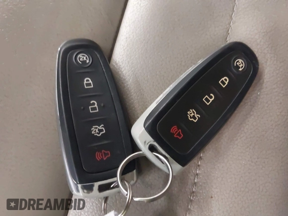 2015 Ford Escape Titanium with VIN 1FMCU9J96FUA43337, listed as a IAAI auction lot 41825328 with 149,639 mi miles and . Bid and sale history available at DreamBid. Image 11.
