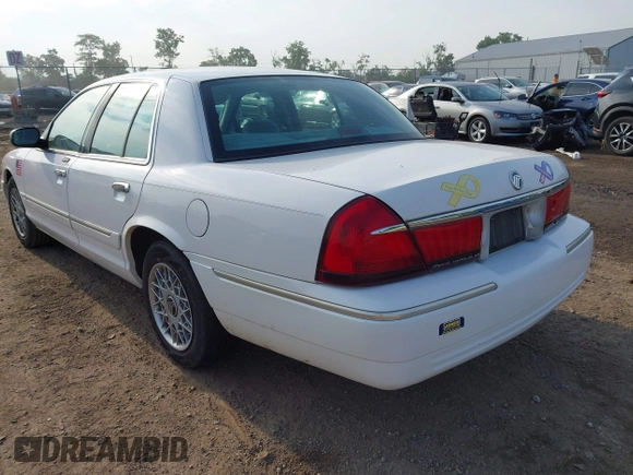 2002 Mercury Grand Marquis GS z VIN 2MEFM74W12X630926, wystawiony jako IAAI lot #42480472 z przebiegiem 58 884 mil mil oraz . Historia ofert i sprzedaży dostępna na DreamBid. Obrazek 3.
