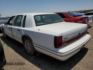 1994 Lincoln Town Car Signature z VIN 1LNLM82W3RY633555, wystawiony jako Copart lot #81430533 z przebiegiem 202 350 mil mil oraz Czysty tytuł • Clean title. Historia ofert i sprzedaży dostępna na DreamBid. Obrazek 2.