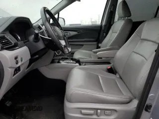 2018 Honda Pilot Touring z VIN 5FNYF6H94JB039992, wystawiony jako Copart lot #57128435 z przebiegiem 85 578 mil mil oraz Szkoda całkowita • Salvage title. Historia ofert i sprzedaży dostępna na DreamBid. Obrazek 7.