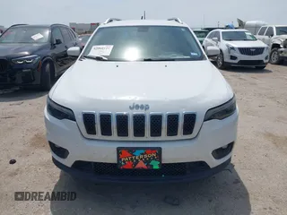 2019 Jeep Cherokee Latitude Plus with VIN 1C4PJLLBXKD220221, listed as a IAAI auction lot 42060125 with 89,452 mi miles and . Bid and sale history available at DreamBid. Image 12.