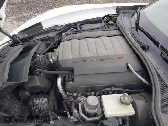 2015 Chevrolet Corvette Z51 3LT z VIN 1G1YM2D72F5119618, wystawiony jako IAAI lot #42744702 z przebiegiem Nie podano mil oraz . Historia ofert i sprzedaży dostępna na DreamBid. Obrazek 10.