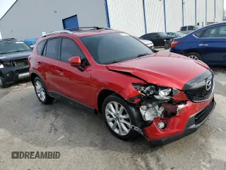 2014 Mazda CX-5 Grand Touring with VIN JM3KE4DY2E0417930, listed as a Copart auction lot 42735065 with 164,701 mi miles and Non Repairable. Bid and sale history available at DreamBid. Image 4.