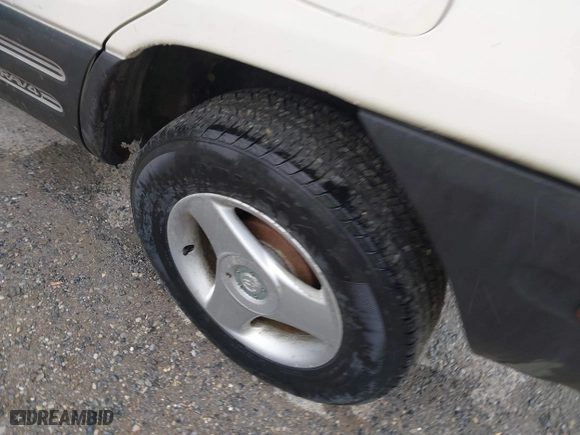 1999 Toyota RAV4 with VIN JT3HP10VXX7115145, listed as a IAAI auction lot 41853011 with 211,121 mi miles. Bid and sale history available at carsss.com. Image 12.