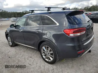 2016 Kia Sorento SX z VIN 5XYPKDA51GG099149, wystawiony jako Copart lot #86369074 z przebiegiem 173 923 mil mil oraz Szkoda całkowita • Salvage title. Historia ofert i sprzedaży dostępna na DreamBid. Obrazek 2.