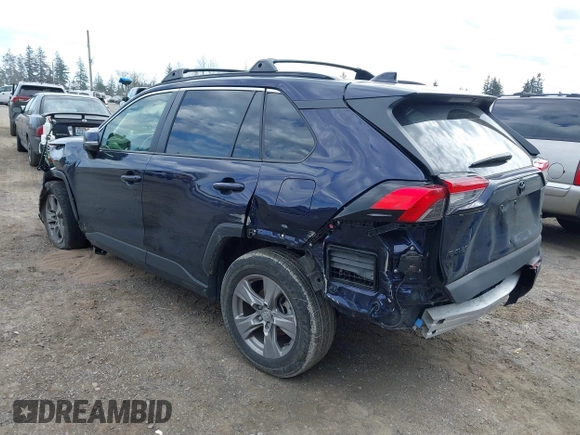 2023 Toyota RAV4 XLE with VIN JTMP1RFV1PD095688, listed as a IAAI auction lot 41874720 with 59,737 mi miles. Bid and sale history available at carsss.com. Image 3.