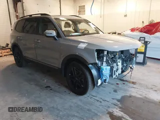 2023 Kia Telluride EX X-Line z VIN 5XYP3DGC7PG361677, wystawiony jako IAAI lot #41274834 z przebiegiem 30 680 mil mil oraz . Historia ofert i sprzedaży dostępna na DreamBid. Obrazek 1.