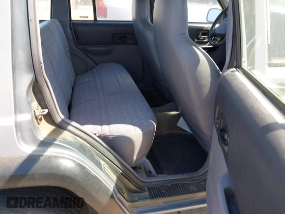 1997 Jeep Cherokee Sport with VIN 1J4FJ68SXVL523204, listed as a IAAI auction lot 42619498 with 270,262 mi miles and . Bid and sale history available at DreamBid. Image 8.