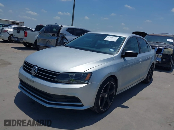 2015 Volkswagen Jetta S with VIN 3VW2K7AJ8FM217026, listed as a IAAI auction lot 42395393 with 181,789 mi miles and . Bid and sale history available at DreamBid. Image 2.