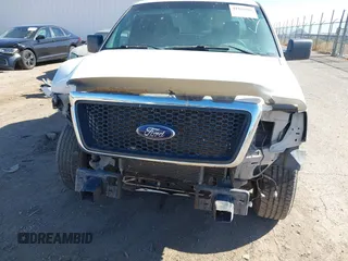 2007 Ford F-150 XLT with VIN 1FTPW12517KD34256, listed as a IAAI auction lot 41828504 with 163,516 mi miles. Bid and sale history available at carsss.com. Image 6.