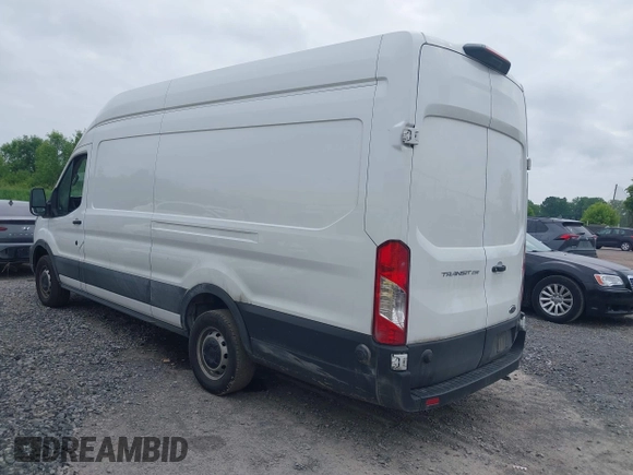 2024 Ford Transit Cargo z VIN 1FTBR3X89RKA14329, wystawiony jako IAAI lot #42483348 z przebiegiem 85 692 mil mil oraz . Historia ofert i sprzedaży dostępna na DreamBid. Obrazek 3.
