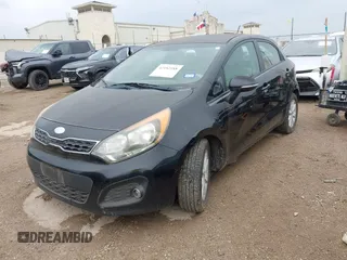 2013 Kia Rio SX with VIN KNADN5A36D6245572, listed as a IAAI auction lot 42182188 with 205,142 mi miles and . Bid and sale history available at DreamBid. Image 2.