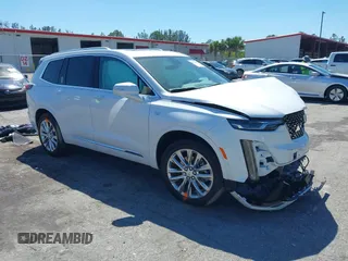 2024 Cadillac XT6 FWD Premium Luxury z VIN 1GYKPCRS0RZ700856, wystawiony jako IAAI lot #41853450 z przebiegiem 6 507 mil mil oraz . Historia ofert i sprzedaży dostępna na DreamBid. Obrazek 1.