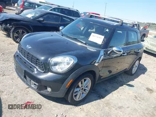 2013 MINI Countryman S ALL4 with VIN WMWZC5C51DWP30972, listed as a IAAI auction lot 40574307 with 153,570 mi miles and . Bid and sale history available at DreamBid. Image 2.