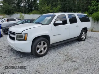 2009 Chevrolet Suburban 2LT with VIN 1GNFC26009R221425, listed as a Copart auction lot 59505755 with 282,828 mi miles and Salvage title. Bid and sale history available at DreamBid. Image 1.