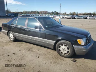1995 Mercedes-Benz S with VIN WDBGA51E7SA246509, listed as a Copart auction lot 79333654 with 143,257 mi miles and Clean Title. Bid and sale history available at DreamBid. Image 4.